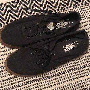 Black and brown Vans